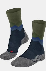 Mountain-style crew socks with an olive green cuff, blue and green wave pattern, navy blue midsection, and gray toe and heel areas, shown on a light gray background.