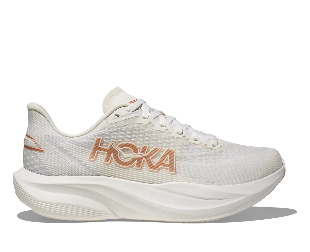 Women's HOKA Mach 7 in Frost/Rose Gold, side view.