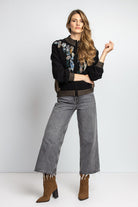 IVKO Roll Neck Jacket with Embroidery in Black on model, front view