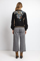 IVKO Roll Neck Jacket with Embroidery in Black on model, three-quarter view