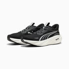 Black running shoes with white soles on a white background