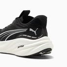 Black and white running shoe with Puma logo on a white background