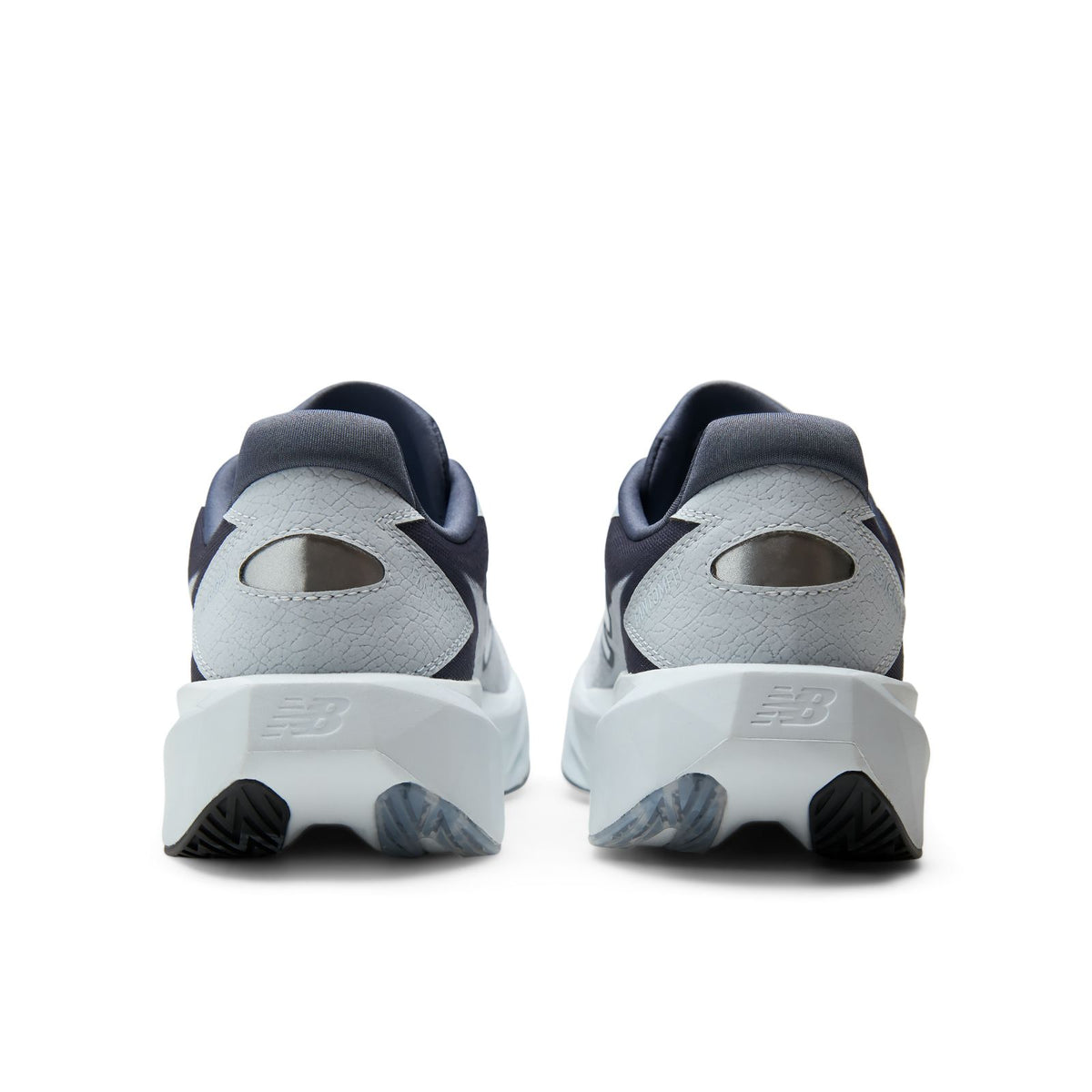 New Balance FuelCell Rebel v5 in Meteorite/White women's running shoe rear view