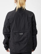 New Balance women's Impact Run Jacket in Black, rear view