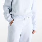 Woman wearing New Balance Sydney Levrone Athletics Crafted Pant in Fresh Air view 1