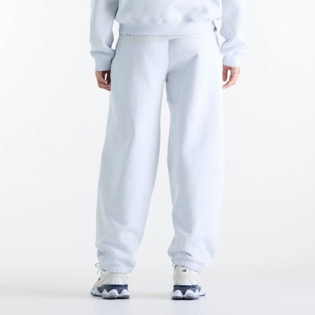 Woman wearing New Balance Sydney Levrone Athletics Crafted Pant in Fresh Air view 2