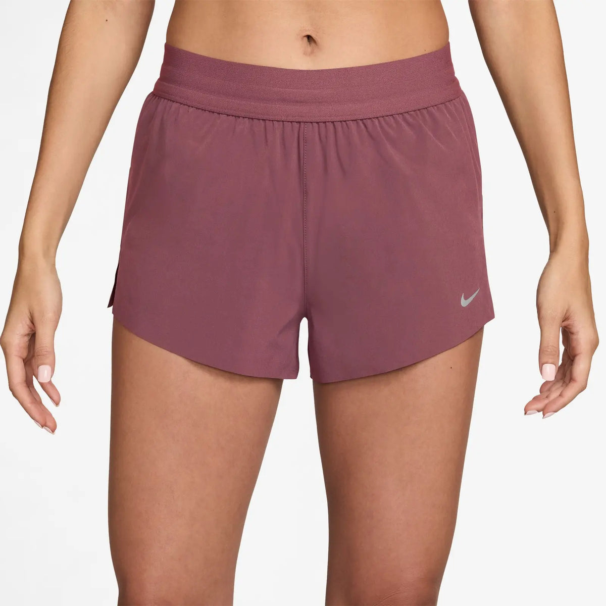 Women's Nike Dri-FIT Mid-Rise 2.5-inch Running Shorts in Pink Rise, front view.