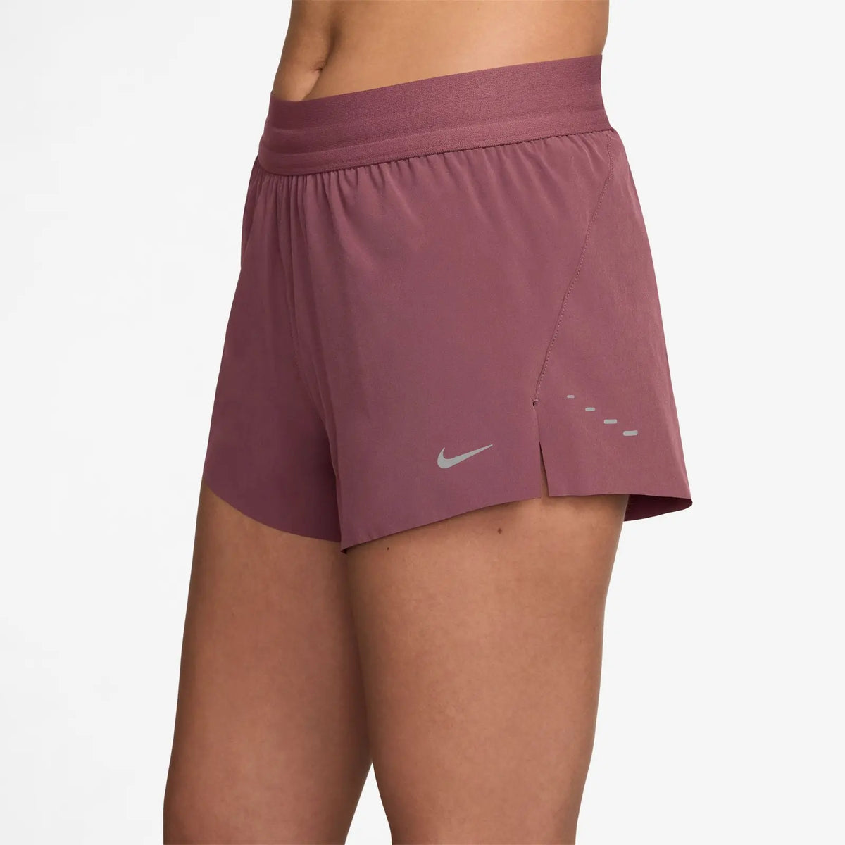 Women's Nike Dri-FIT Mid-Rise 2.5-inch Running Shorts in Pink Rise, three-quarter view.