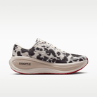 Nike Vomero Plus men's shoes in Sail/Black/University Red with animal-print upper — opposite side profile.