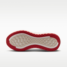 Nike Vomero Plus men's shoes in Sail/Black/University Red with animal-print upper — outsole view.