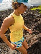Women's Oiselle Flyout Trail Tank in Lemon/White, trail-running view