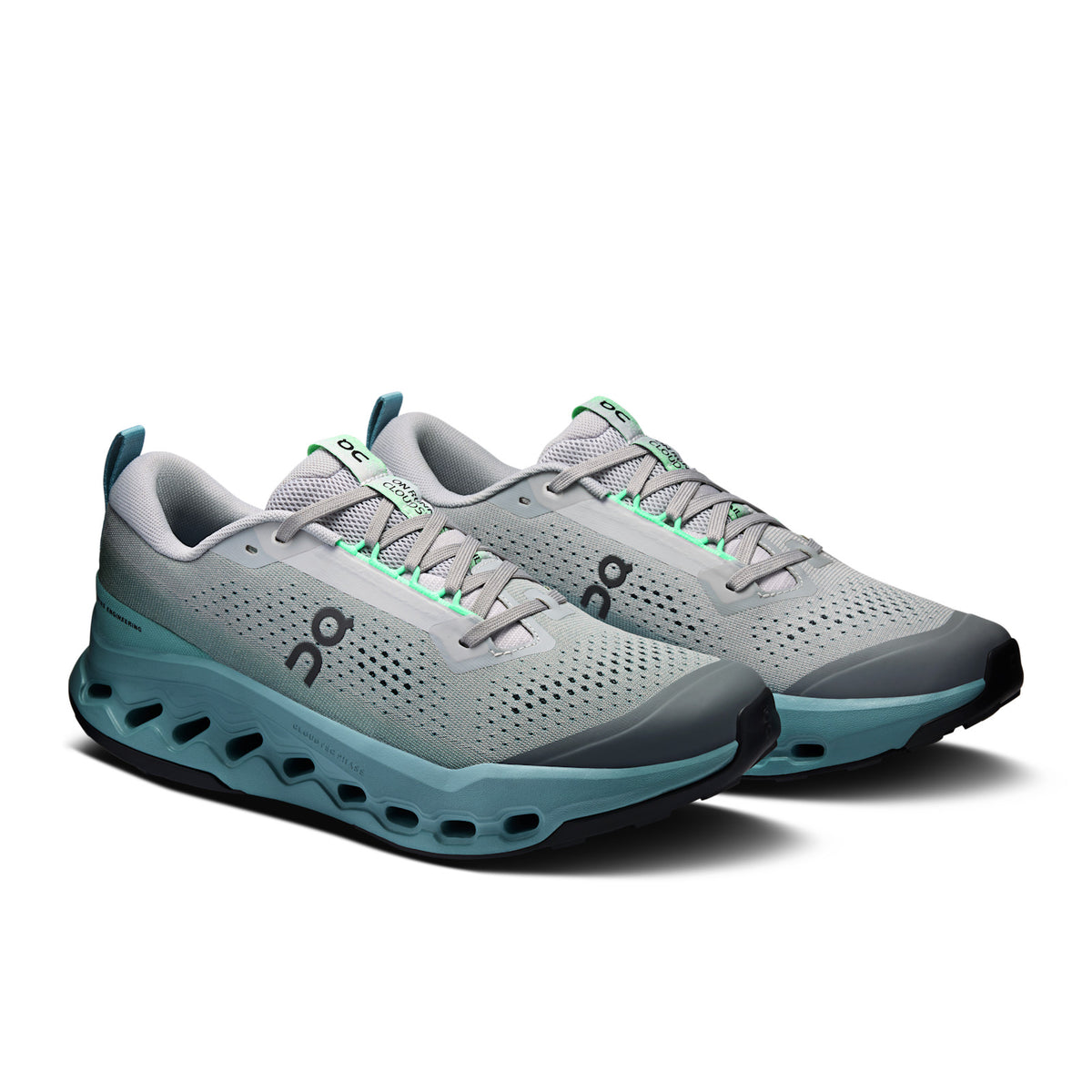 On Running Cloudsurfer Trail 2 men's trail running shoe in Platinum/Tide — front three-quarter view of the pair