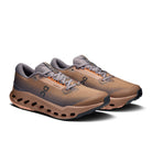 On Running Cloudsurfer Trail 2 Waterproof men's trail running shoe in Portobello/Pebble — front three-quarter view of the pair