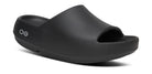 Unisex Oofos OOahh PLUS Slide in Black, three-quarter view.
