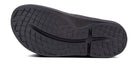 Oofos Ooahh Slide. Black. Bottom view.
