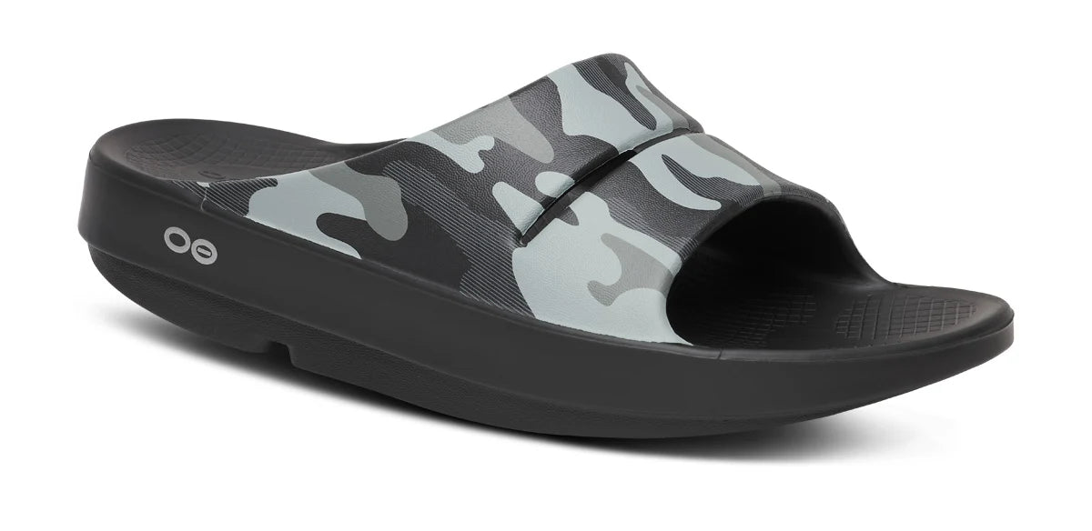 Unisex Oofos OOahh Sport Slide in Night Camo, three-quarter view.