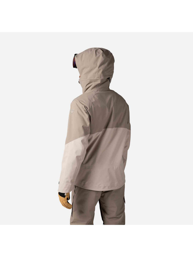 Rossignol Evader men's ski jacket in Dune, back view