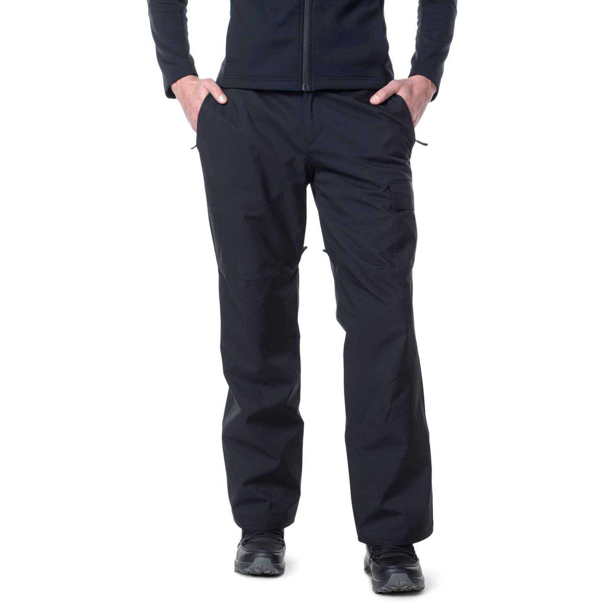 Person wearing black pants on a white background
