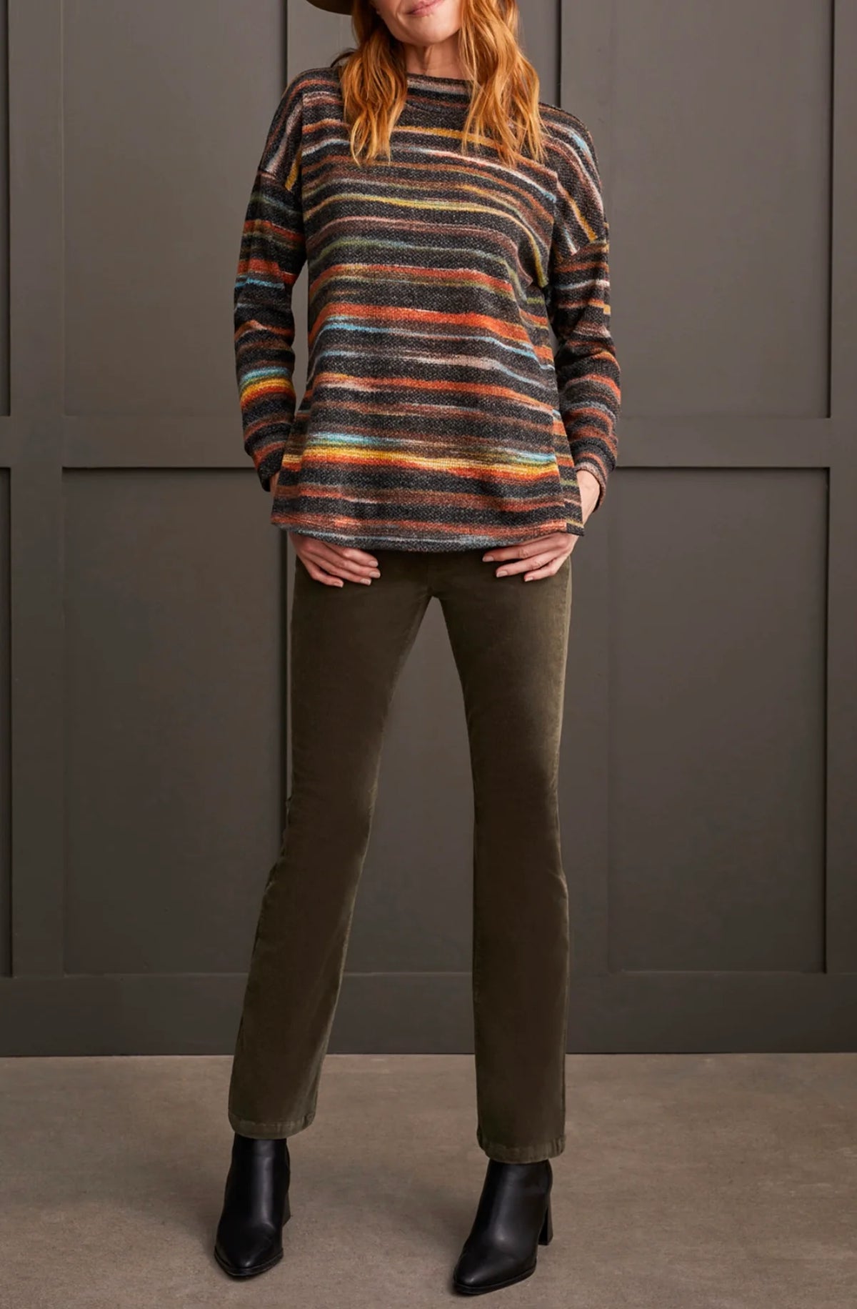 Tribal women's Variegated Stripe Mock Neck Top in Rust, full front view on model.