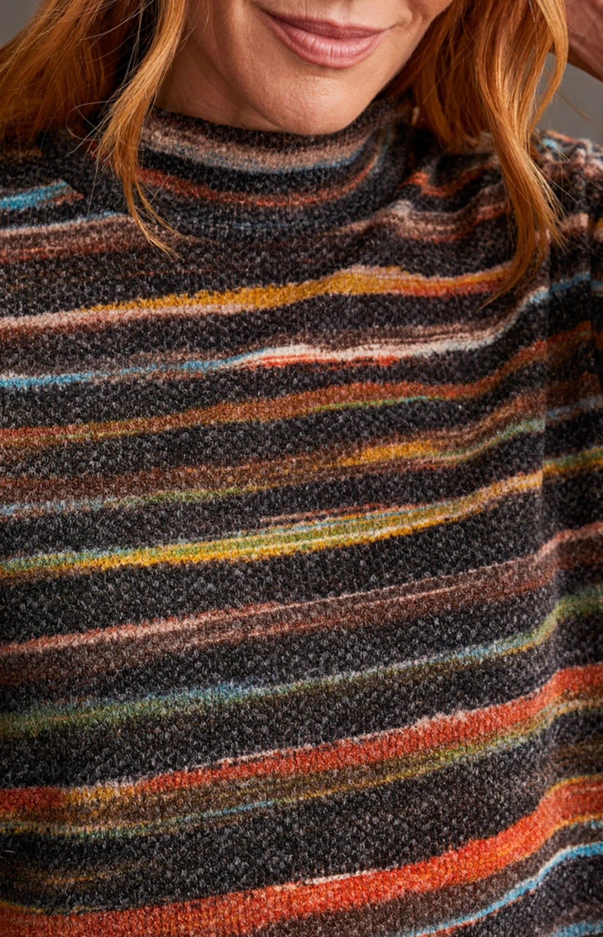 Tribal women's Variegated Stripe Mock Neck Top in Rust, close-up of mock neckline and textured knit.