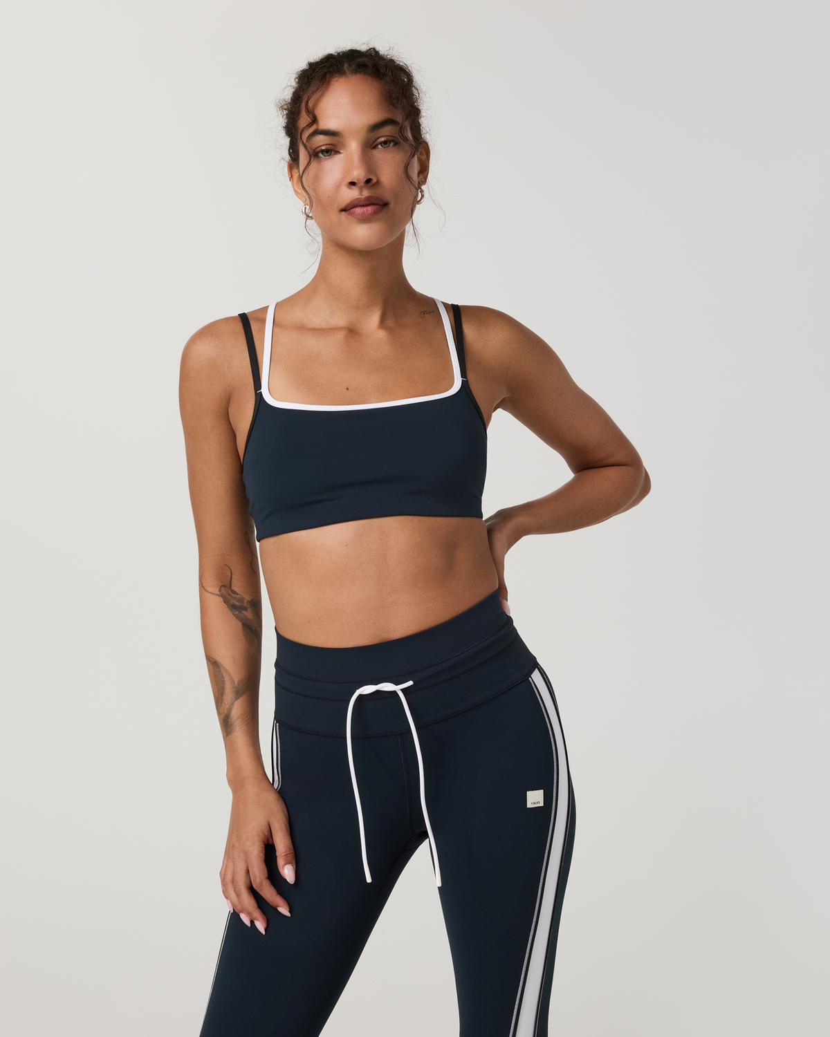Vuori Daily Layered Bra women's sports bra in Ink — front view on model