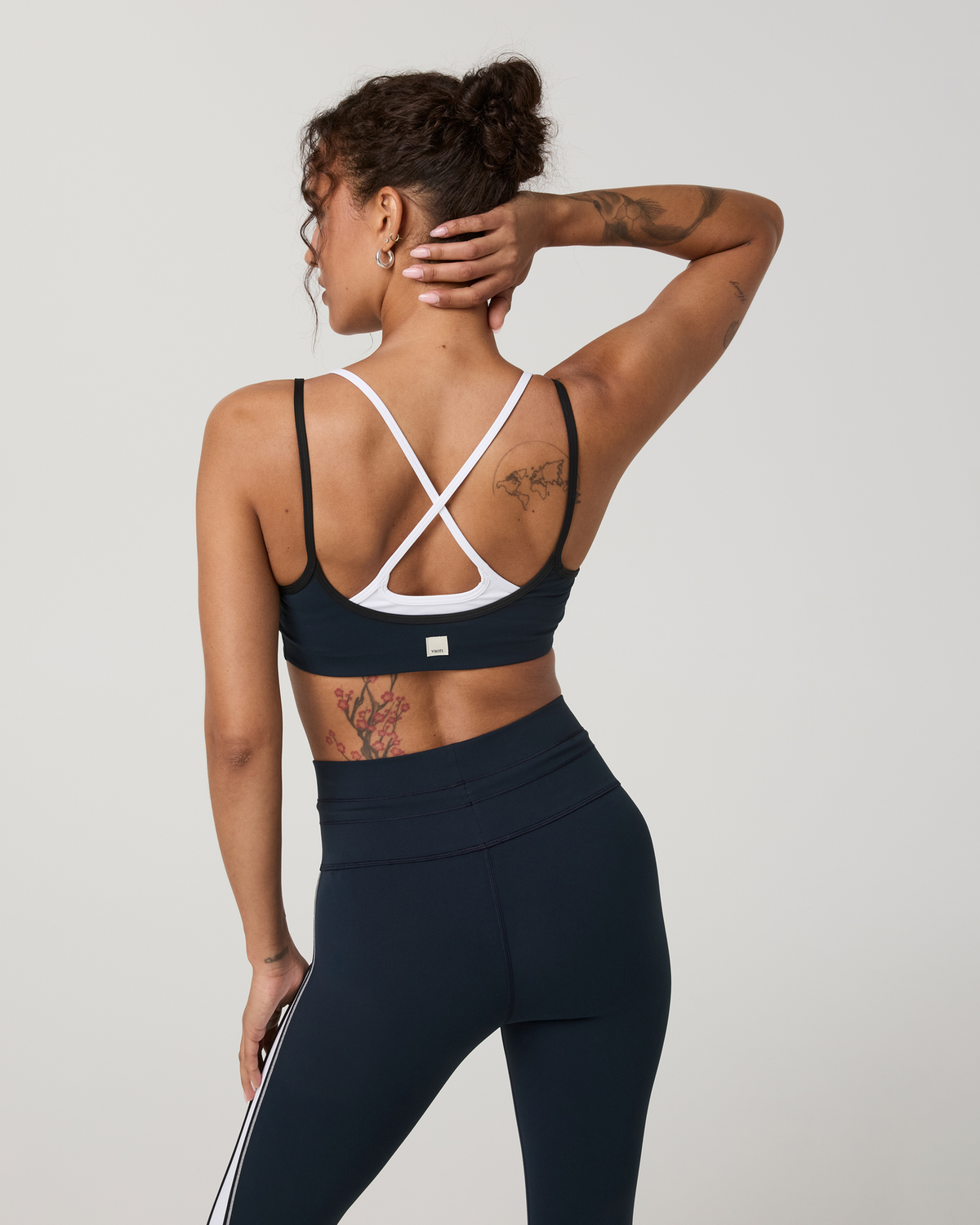 Vuori Daily Layered Bra women's sports bra in Ink — layered straps and open-back view
