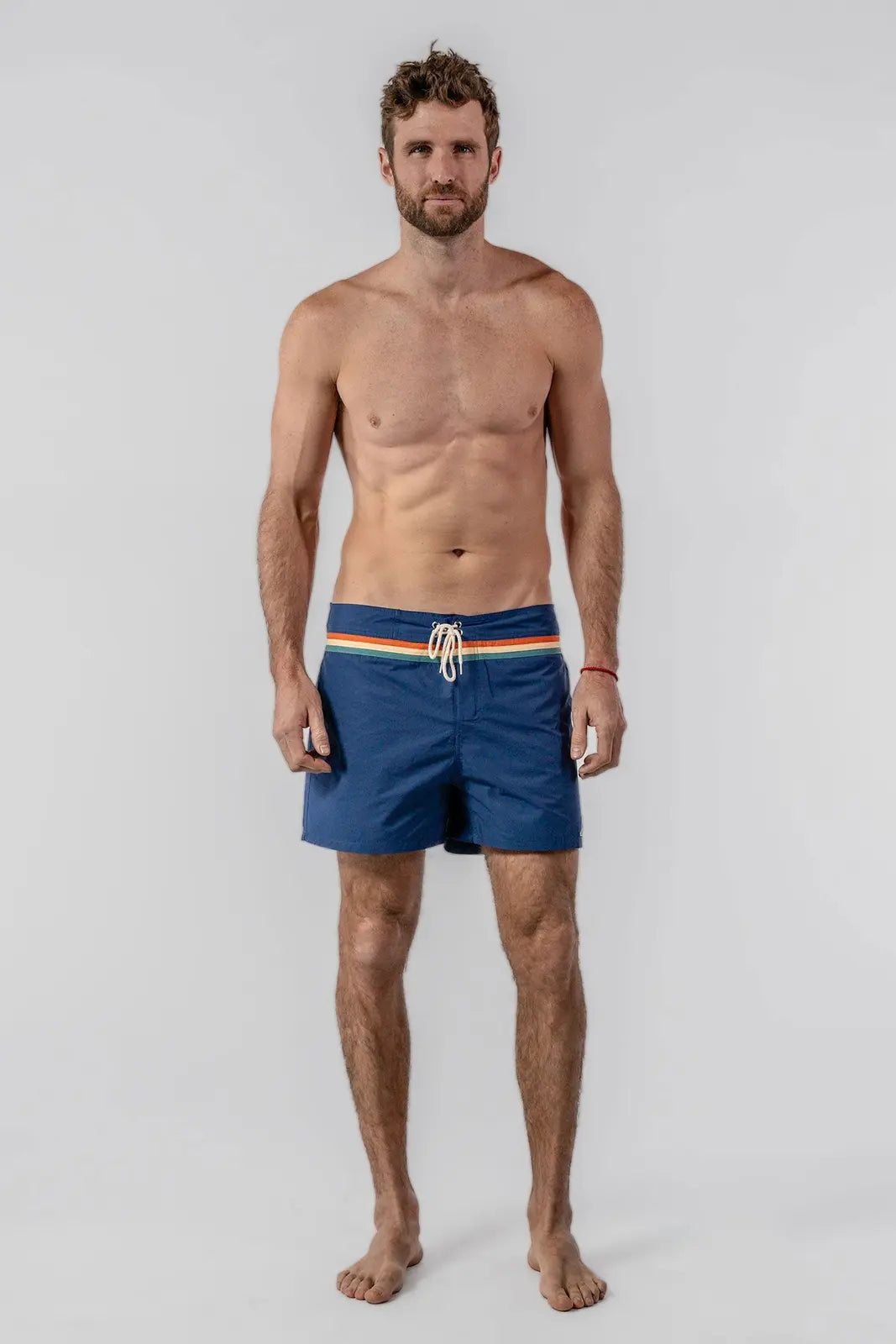 Woodpecker men's Navy swim shorts shown from the front