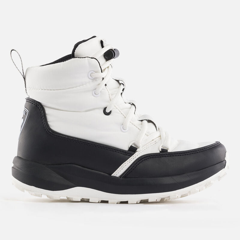 A pair of Rossignol Podium Winter Boots for women, featuring black and white colors with a rugged rubber outsole designed for winter conditions.