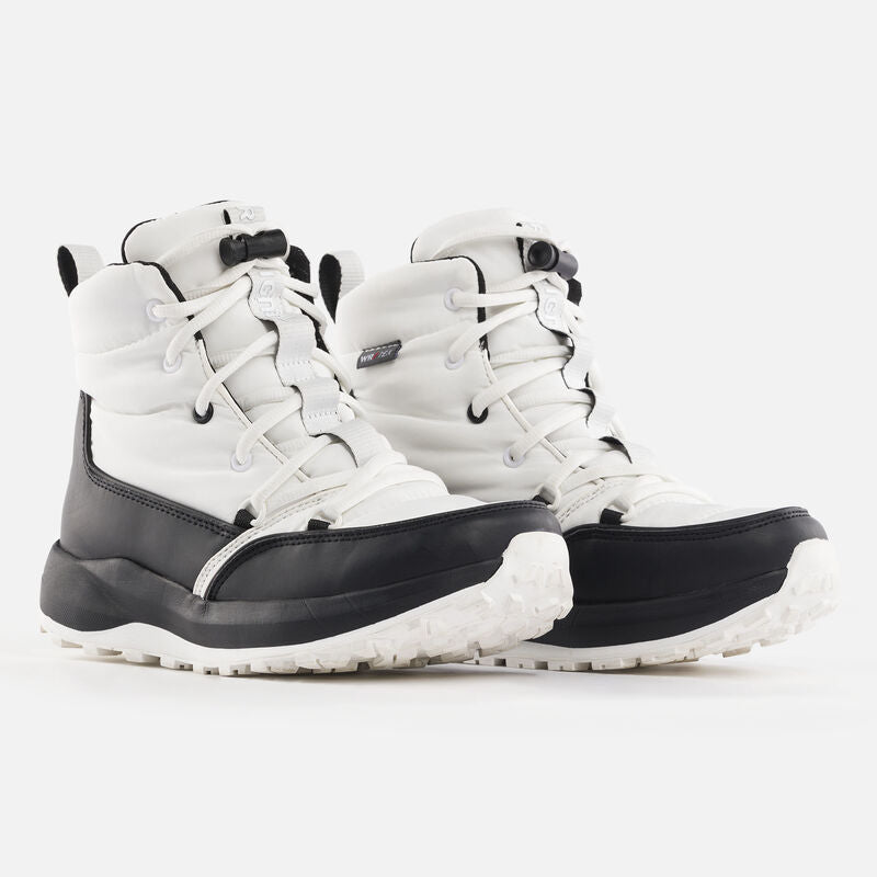 A pair of Rossignol Podium Winter Boots for women, featuring black and white colors with a rugged rubber outsole designed for winter conditions.