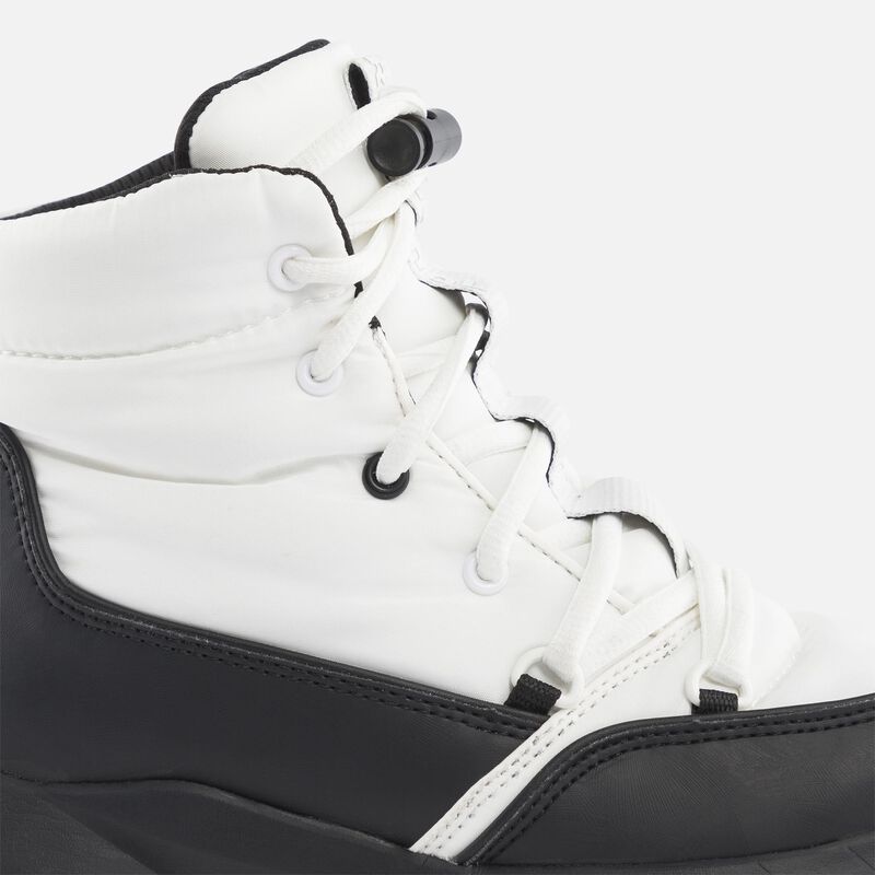 closeup of the laces on a white/black boot