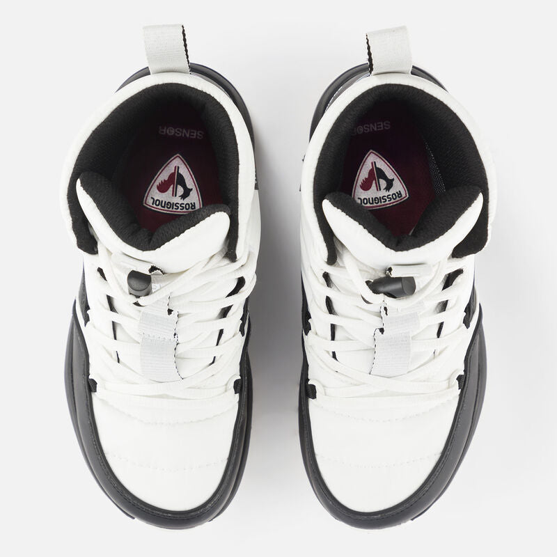 Top down view of a white and black boot.  Red insoles are visible.