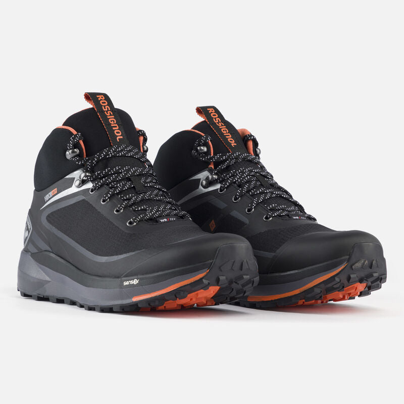 A pair of black Rossignol waterproof hiking boots for men with orange accents, featuring a high-cut design, lace-up closure, and a rugged outsole.