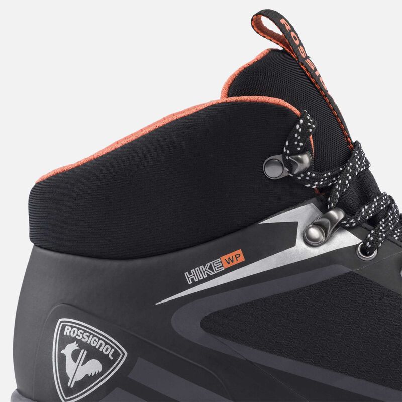 closeup view of ankle area showing neoprene detaining and waterproof label as well as the rossignol logo