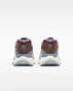 Pair of sneakers shown from the back on a white background