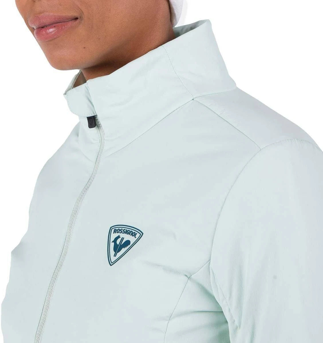 Light blue jacket with a brand logo on the chest against a white background