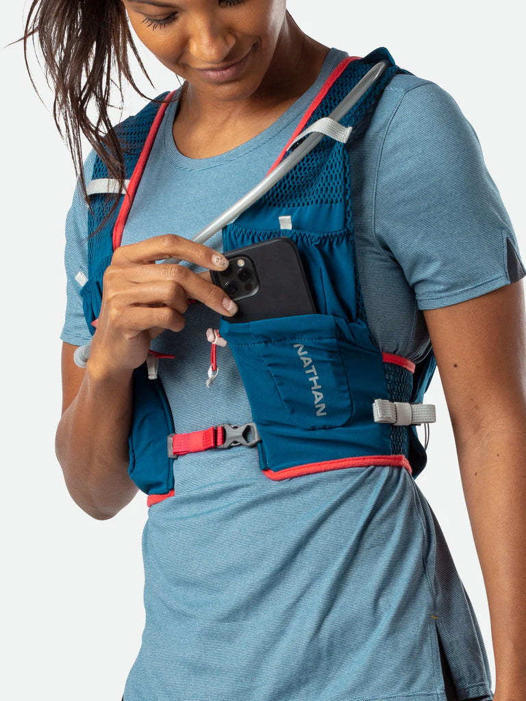 Women's Nathan VaporAiress Lite 4 Liter Hydration Vest. Blue. Front view.