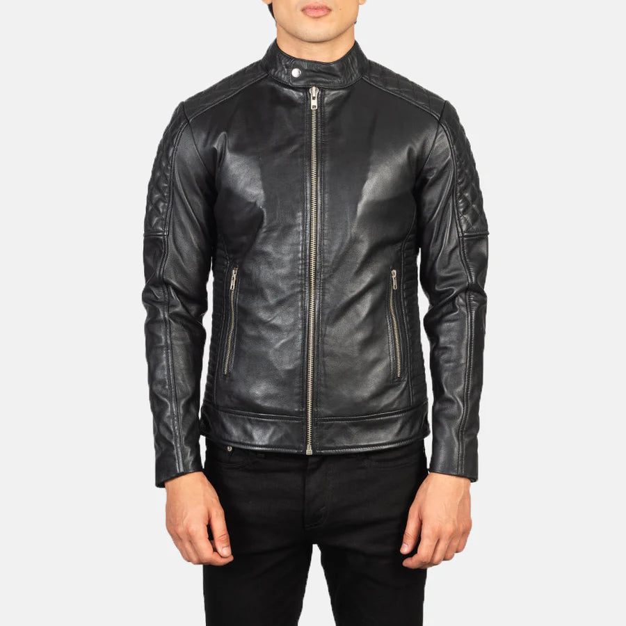 Black leather jacket worn by a person on a white background