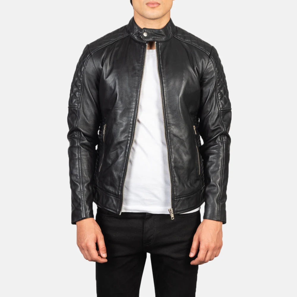 Person wearing a black leather jacket on a white background