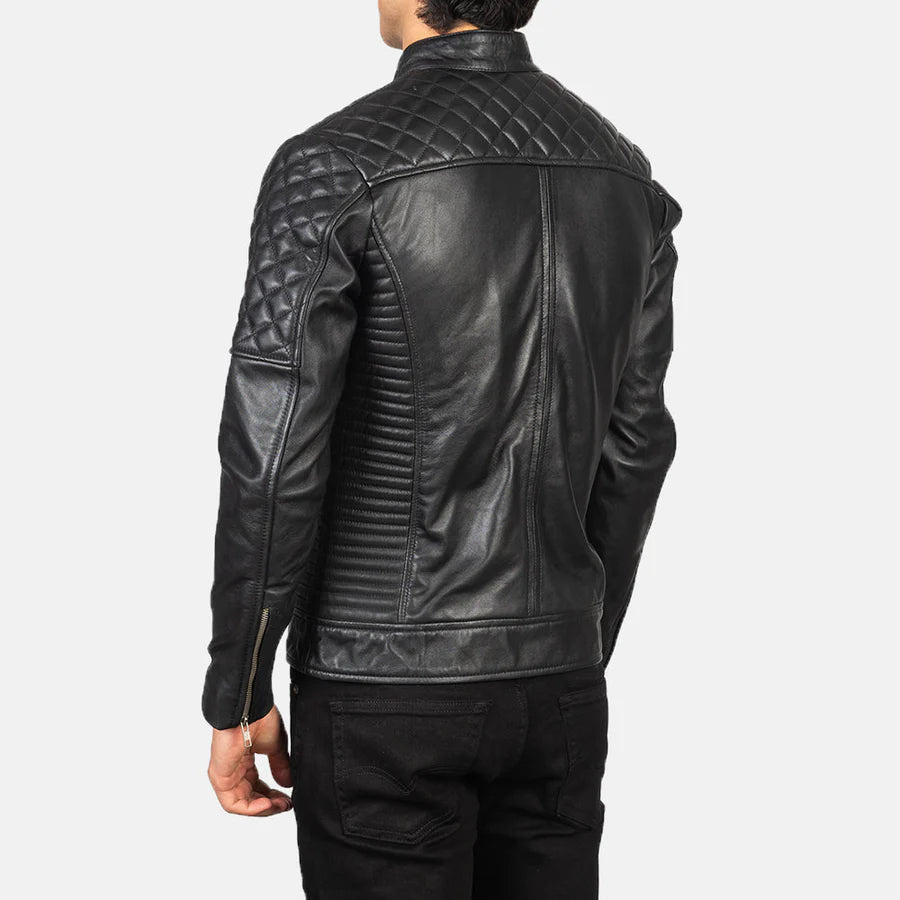 Black leather jacket with quilted design on a white background