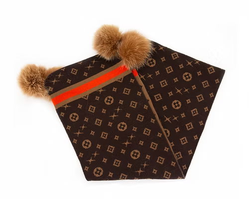 knit scarf with fur pom-poms and orange zipper on a white background