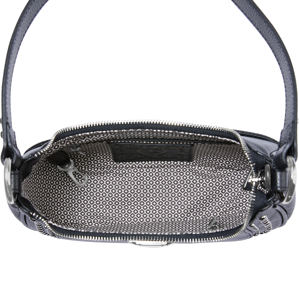 Close-up of a black crossbody bag with a textured pattern on a white background