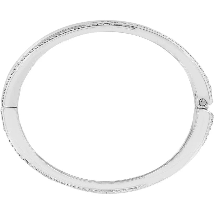 Silver bangle on a white background