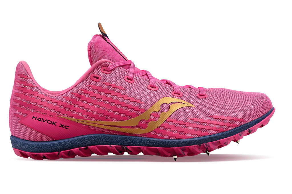 Women's Saucony Havok XC 3. Pink upper. Blue midsole. Lateral view.