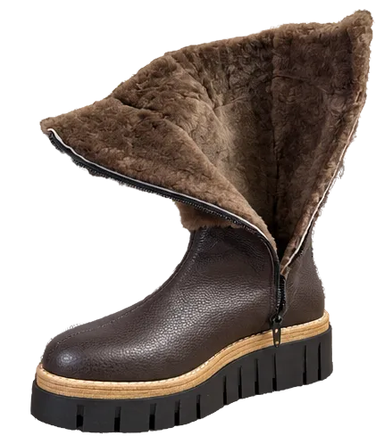 A dark brown leather boot with a plush brown shearling lining and a black lug sole, shown on a white background with a partial view of another boot at the top.
