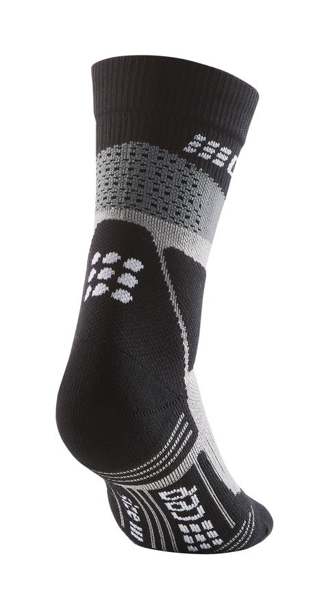 Men's CEP Max Cushion Mid Compression Socks. Black. Rear/Lateral view.
