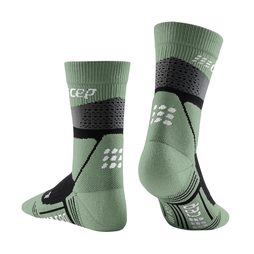 Men's CEP Max Cushion Mid Compression Socks. Green. Rear/Lateral view.