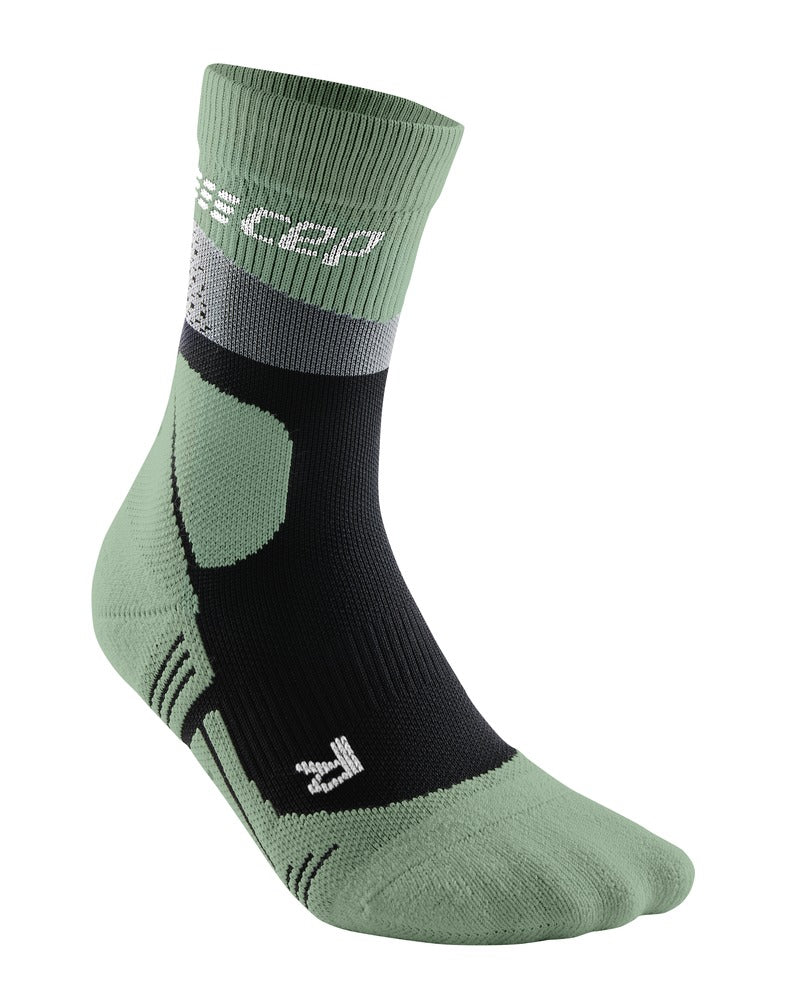 Men's CEP Max Cushion Mid Compression Socks. Green. Lateral view.