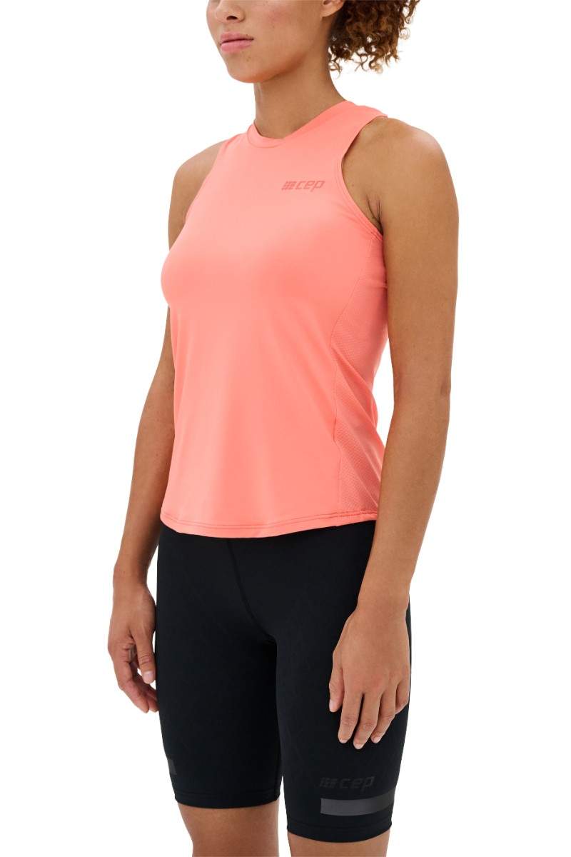 Women's CEP The Run Tank Top. Coral. Front/Lateral view.