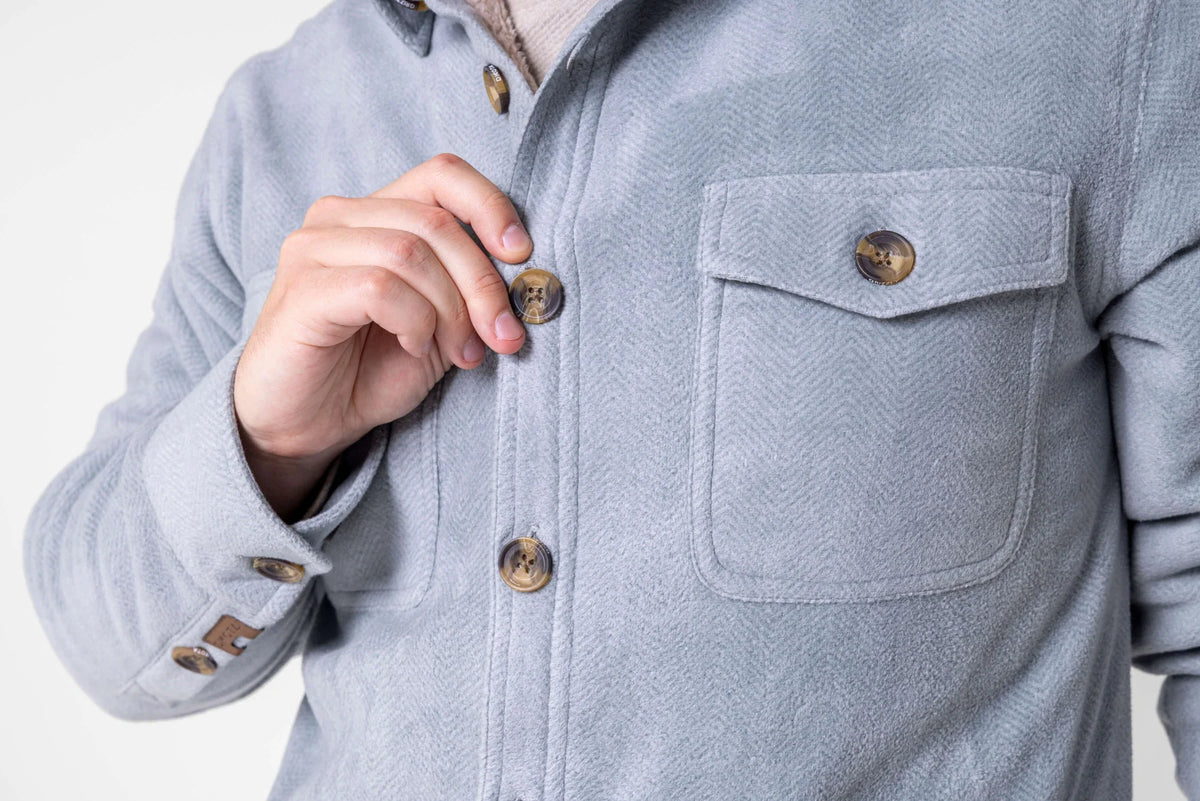 Close-up of Dakota Grizzly Rocco jacket's herringbone fleece, horn-style buttons and chest pocket