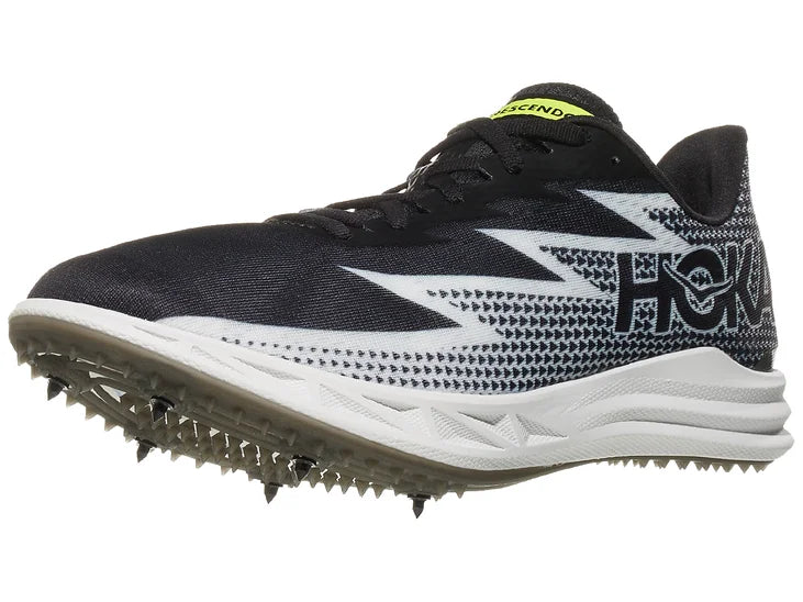Hoka Crescendo MD Spikes/ Black/silver upper. White midsole. Lateral view.